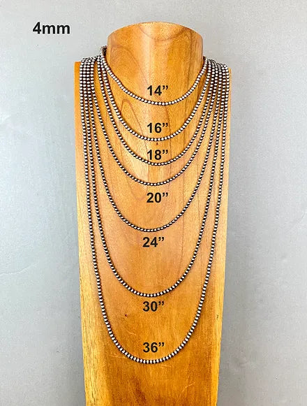 Set of sterling silver pearl beaded necklaces on a wooden mannequin with measurements displayed.
