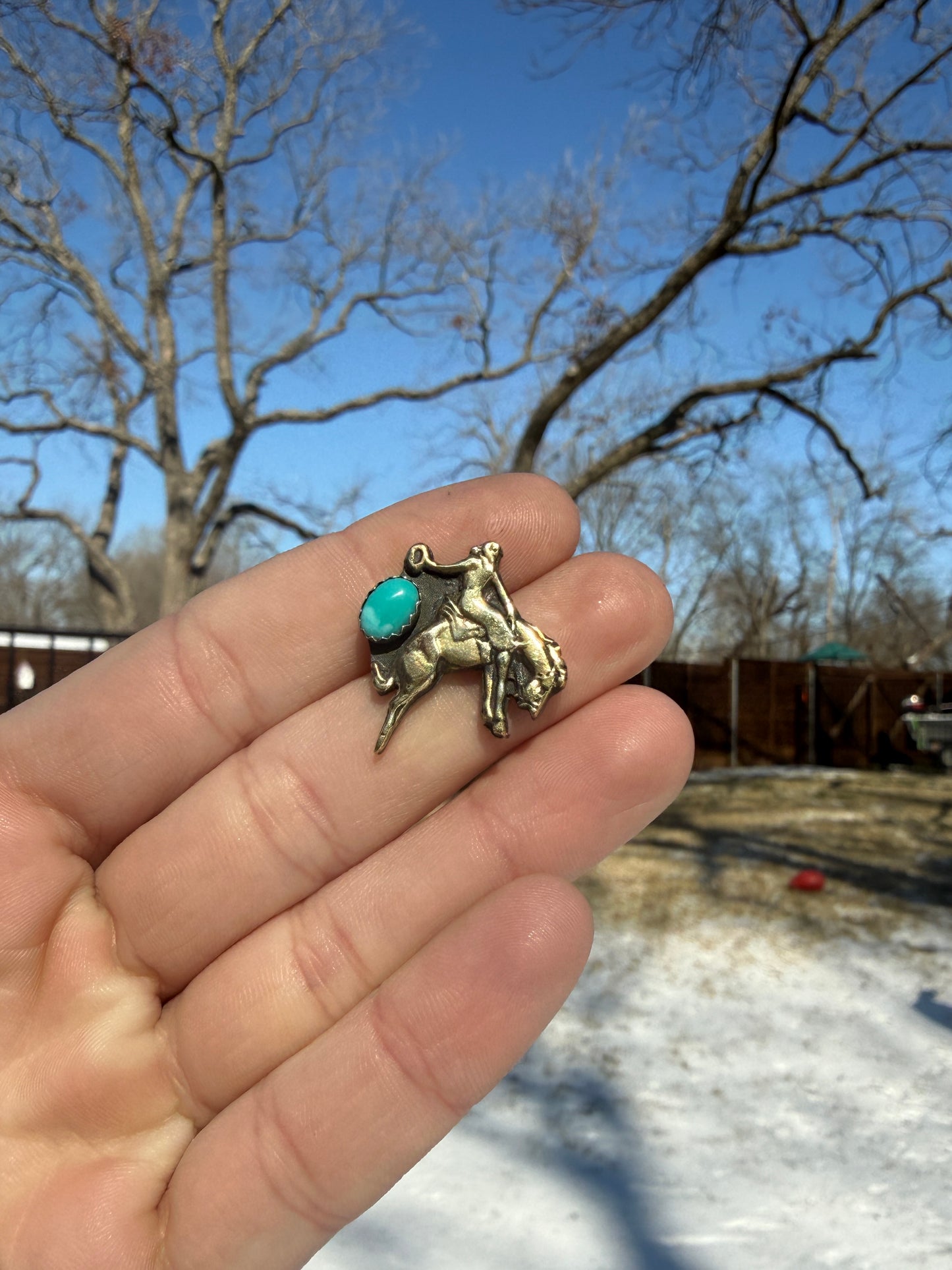 Handmade Brass bucking horse pin with Kingman