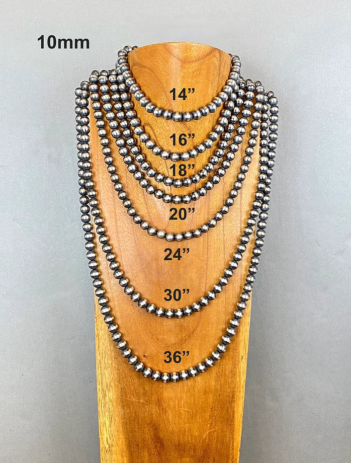 Set of beaded necklaces on a wooden stand with measurements indicated.