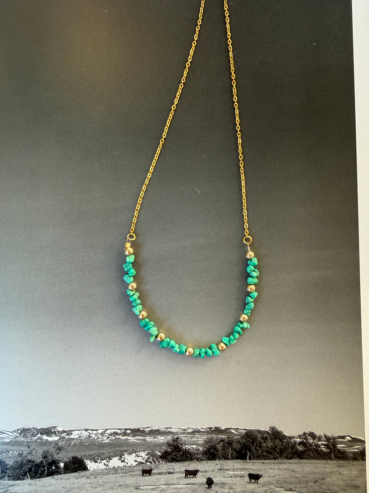 Mountain gold beaded necklace
