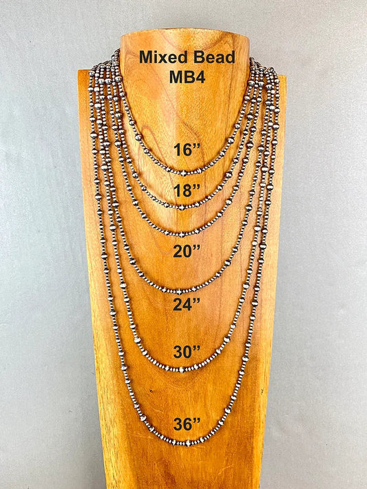 Wooden display with mixed bead necklaces of different lengths on a gray background